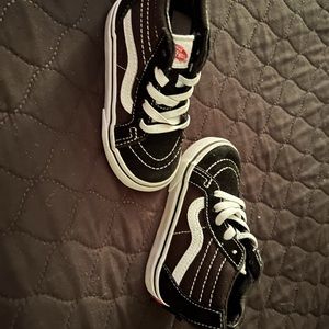 Vans high tops black and white. Only worn a few time.